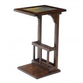 A CANTILEVERED SIDE TABLE A ca