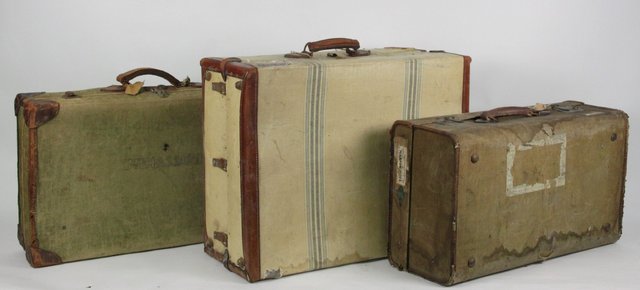 A canvas and leather cabin trunk