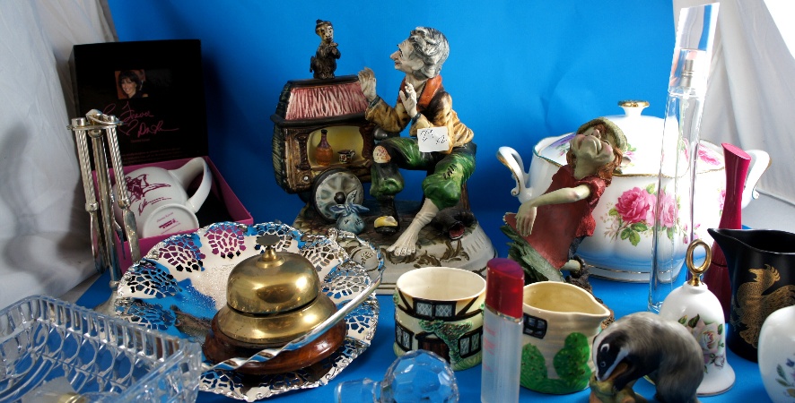 A Capo de Monte Figurine of an