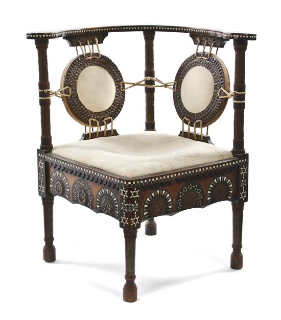A Carlo Bugatti Walnut Corner Chair