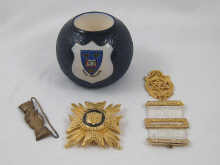 A Carlton ware match striker with