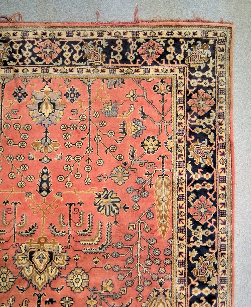 A carpet of Ushak design woven in
