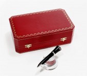 A CARTIER BLACK LACQUER COMBIN