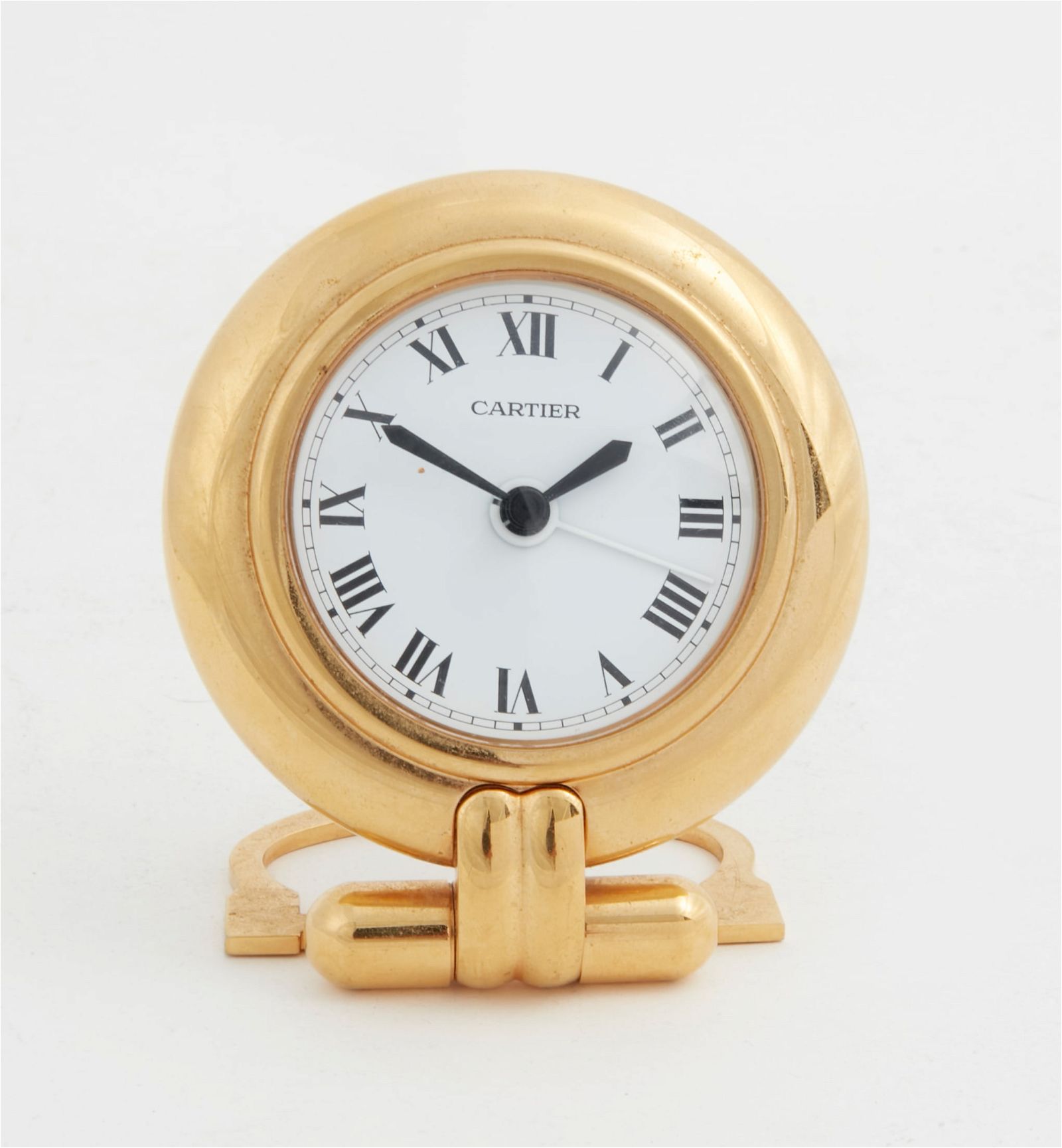 A CARTIER GILT BRASS COLISEE