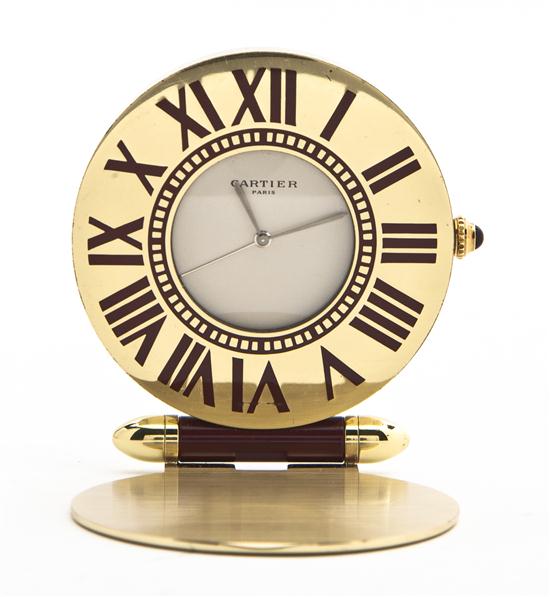 A Cartier Gilt Metal and Enameled