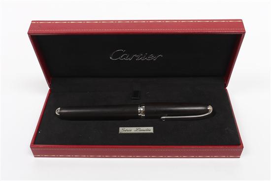 A Cartier Platinum and Ebony