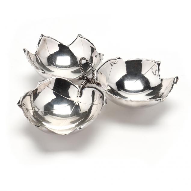 A CARTIER STERLING SILVER LEAF BOWL