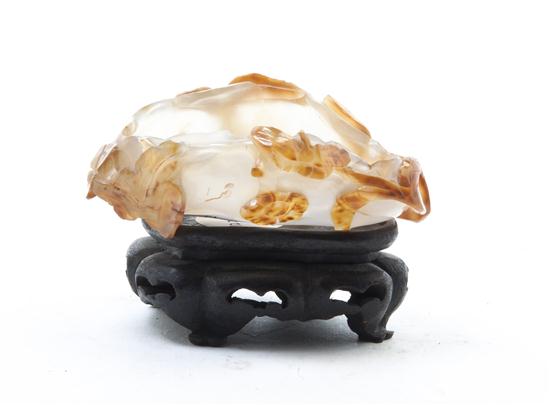 A Carved Agate Brush Washer on a