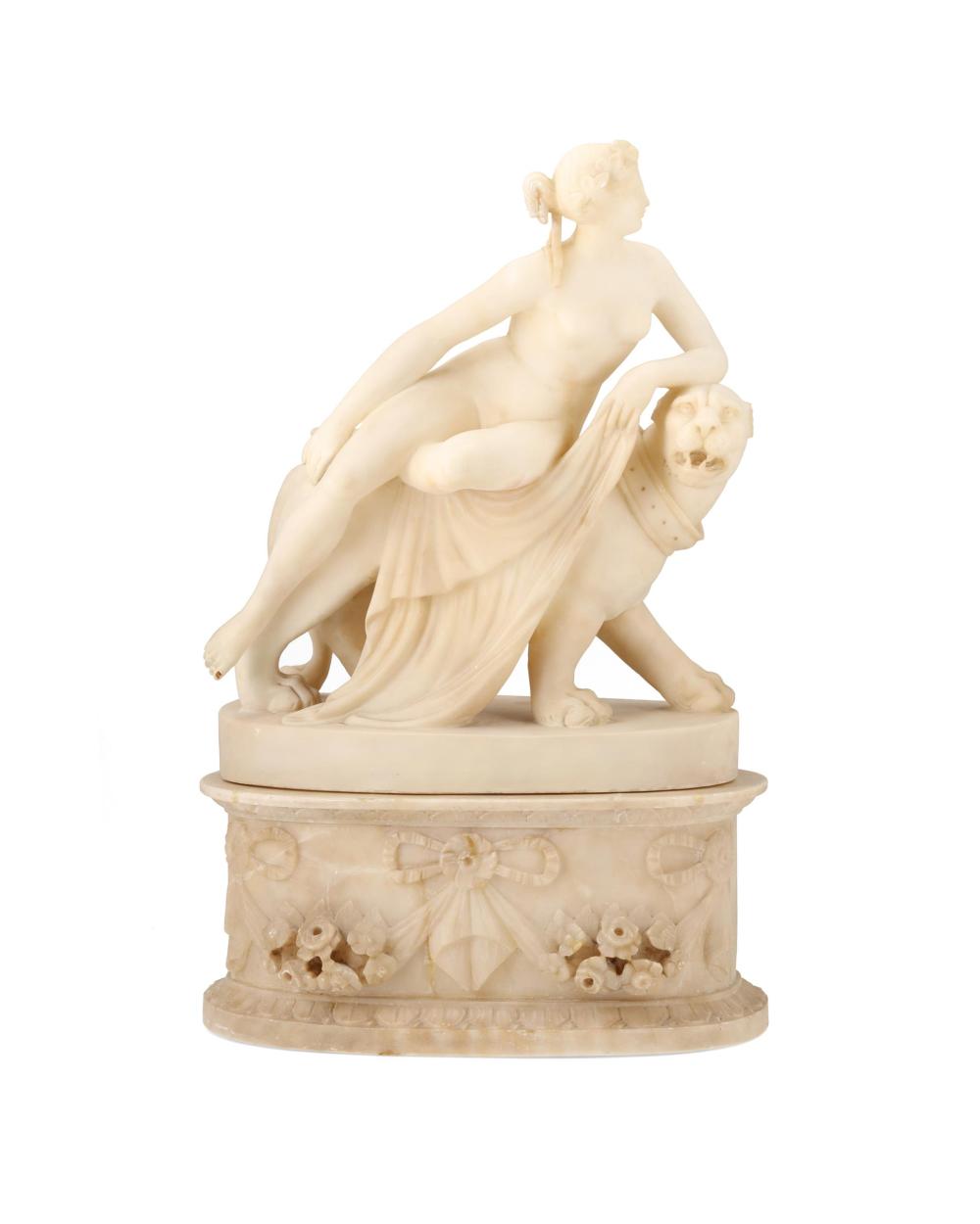 A CARVED ALABASTER SCULPTURE OF A