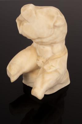 A carved alabaster torso of a