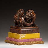 A CARVED ALOESWOOD BEASTS SEAL