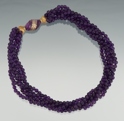 A Carved Amethyst Torsade