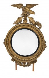 A CARVED AND GILTWOOD BULLSEYE