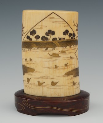 A Carved and Inlaid Ivory and