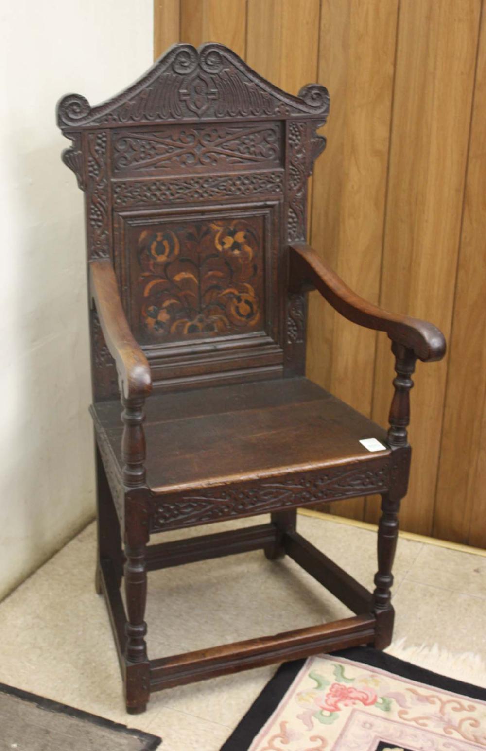 A CARVED AND INLAID WAINSCOT