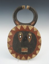 A Carved and Painted African T
