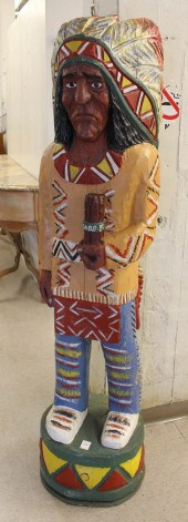 A CARVED AND PAINTED 'CIGAR ST