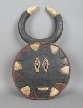 A Carved and Painted Goli Soci