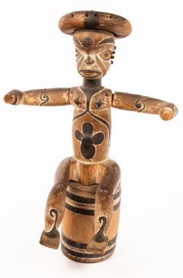 A carved and painted tribal