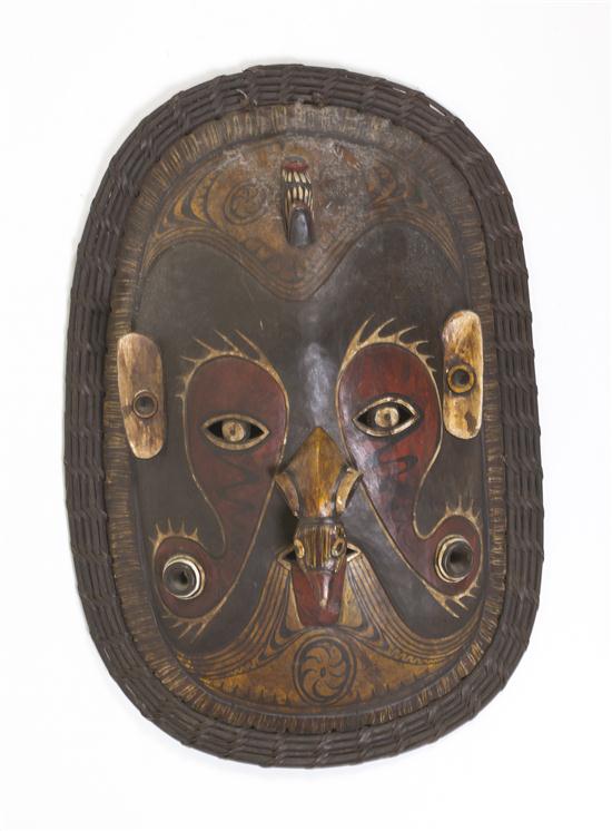 A Carved and Painted Wood Tiki Mask