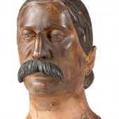 A Carved and Painted Wood Head