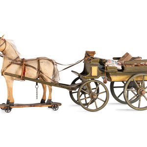 A Carved and Painted Wood Wagon