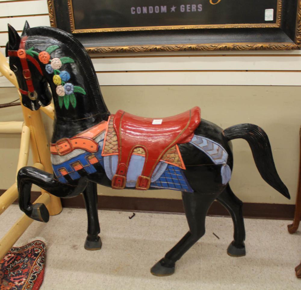 A CARVED AND PAINTED WOOD