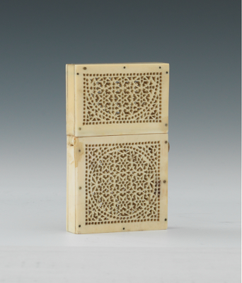 A Carved and Pierced Ivory or