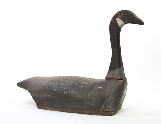 * A Carved and Polychrome Painted