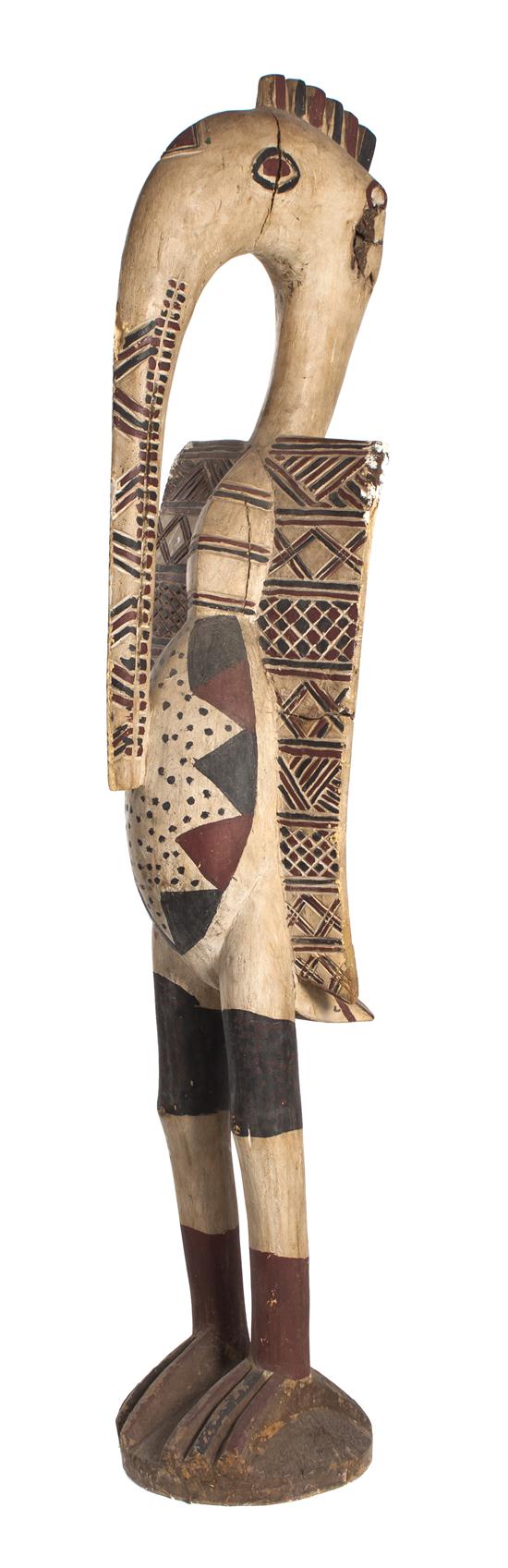 A Carved and Polychrome Decorated
