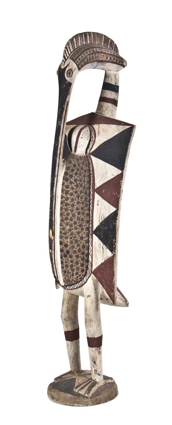 A Carved and Polychrome Decorated