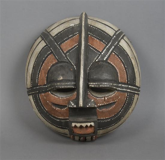 A Carved and Polychrome Decorated