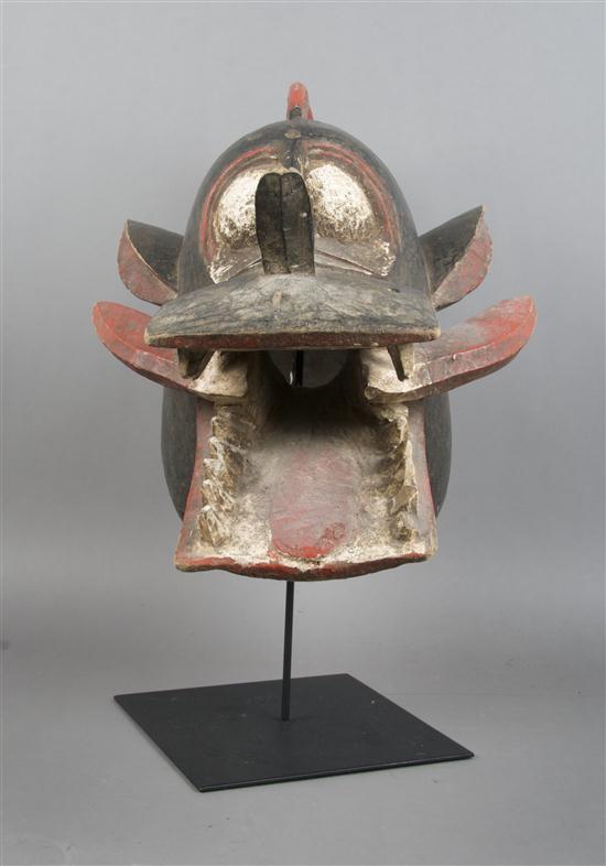 A Carved and Polychrome Decorated