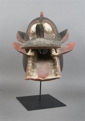 A Carved and Polychrome Decora