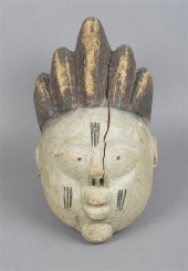 A Carved and Polychrome Decora