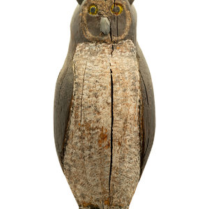 A Carved and Polychrome Decorated