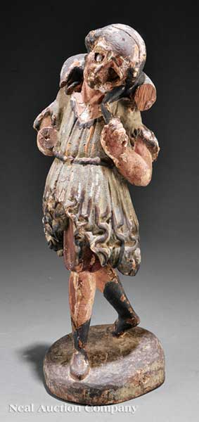 A Carved and Polychromed Wood