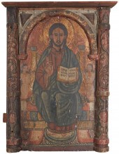 A CARVED AND POLYCHROMED WOOD