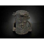 A CARVED BENIN WOODEN HEAD OF