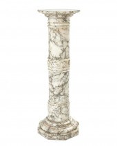 A CARVED CARRERA MARBLE LIGHTE