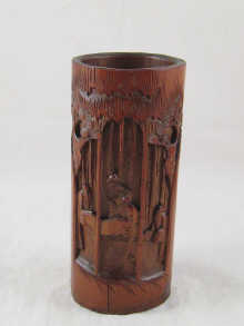 A carved Chinese bamboo brush