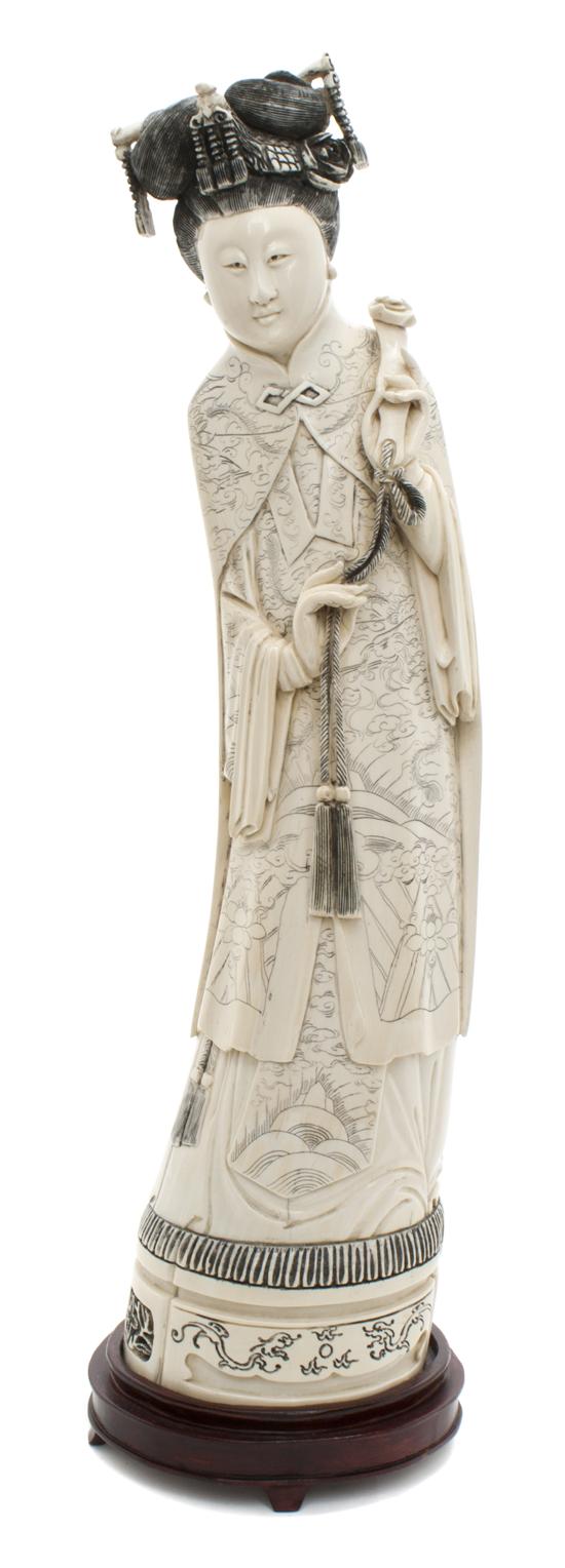 A Carved Chinese Ivory Figure of