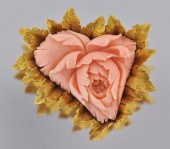 A Carved Coral and Gold Brooch