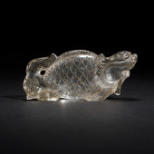 A CARVED CRYSTAL FISH-DRAGON<b