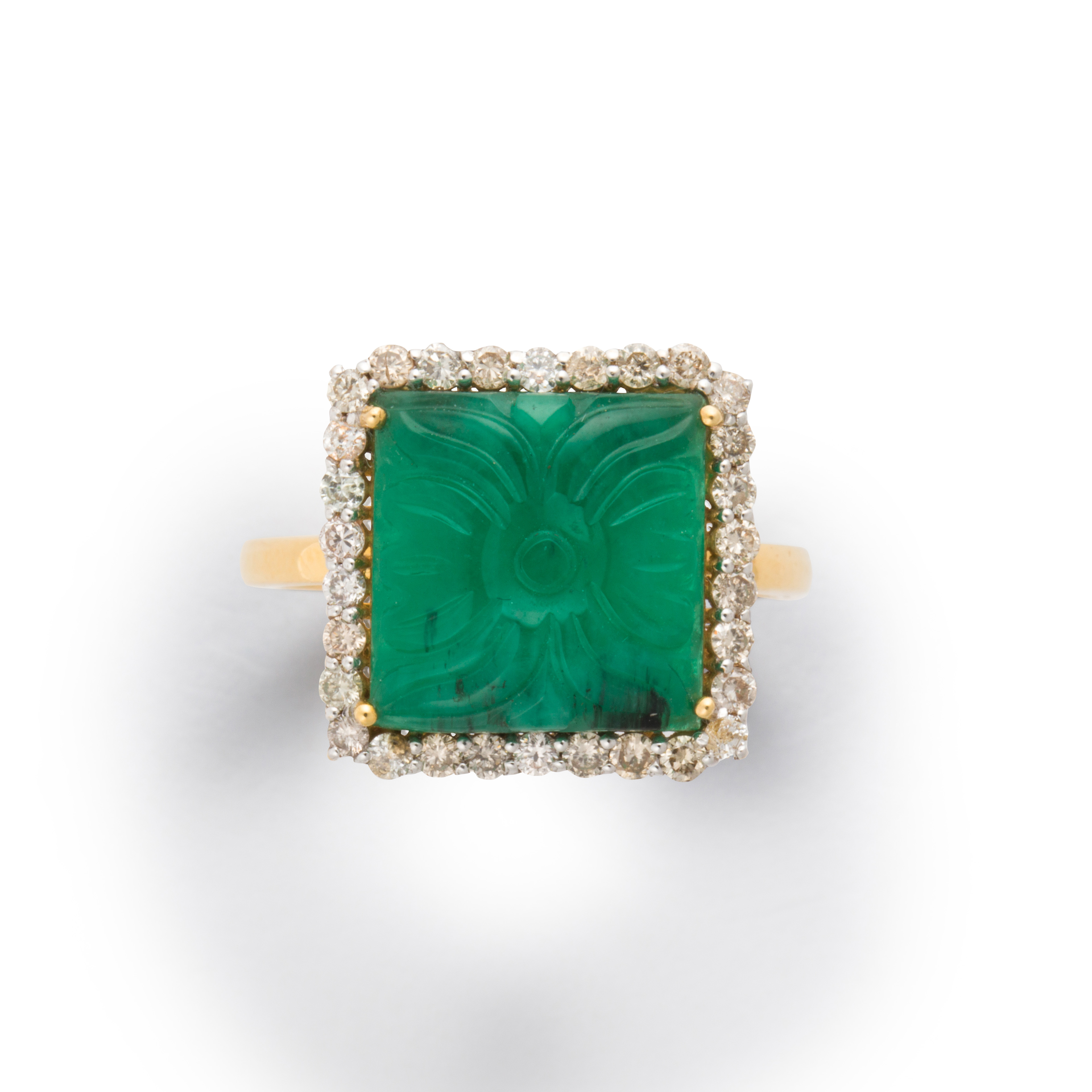 A CARVED EMERALD, DIAMOND AND