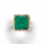 A CARVED EMERALD, DIAMOND AND
