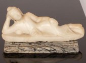 A carved figure of a Buddha, 3