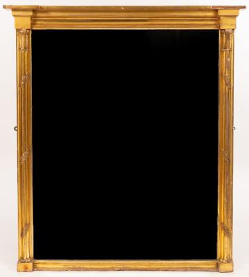 A carved giltwood wall mirror,