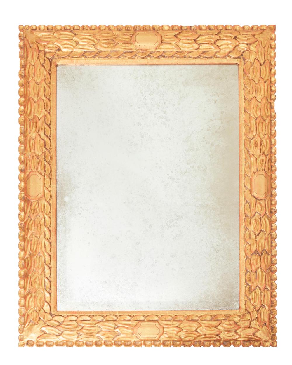 A CARVED GILTWOOD WALL MIRRORA