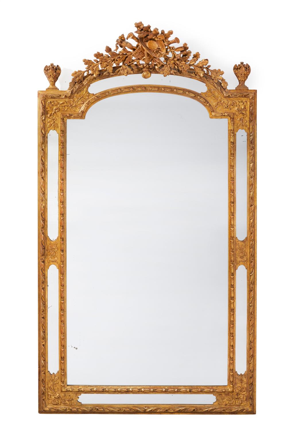 A CARVED GILTWOOD WALL MIRRORA